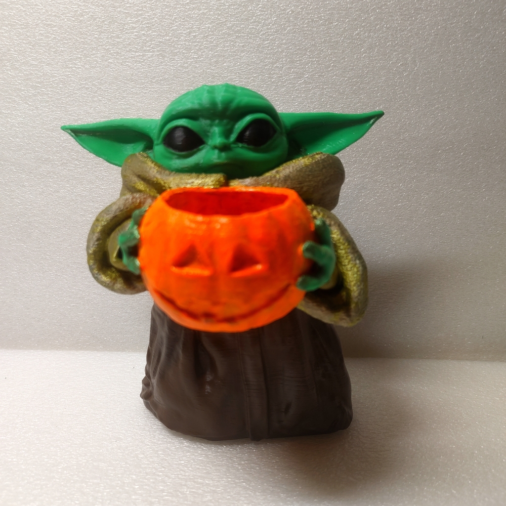 Green Baby Yoda Figurine Holding Orange Pumpkin - Picture 2 of 9